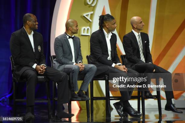 David Robinson, Tony Parker, Tim Duncan, Manu Ginóbili look on during the 2023 Basketball Hall of Fame Enshrinement Ceremony on August 12, 2023 at...