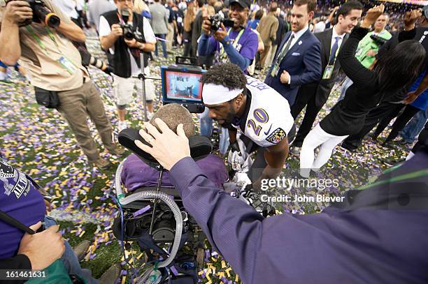 Super Bowl XLVII: Baltimore Ravens Ed Reed victorious with former player O.J. Brigance after winning game vs San Francisco 49ers at Mercedes-Benz...