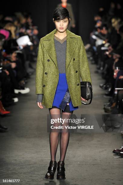 Model walks the runway at the Rag & Bone Women's Ready to Wear Fall/Winter 2013-2014 fashion show during Mercedes-Benz Fashion Week at Skylight...