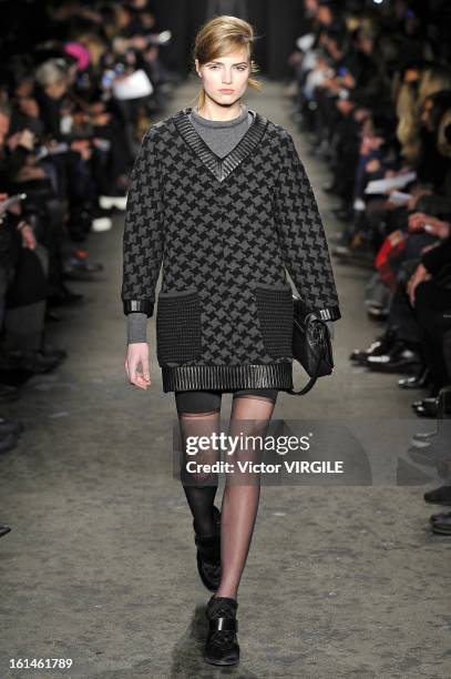 Model walks the runway at the Rag & Bone Women's Ready to Wear Fall/Winter 2013-2014 fashion show during Mercedes-Benz Fashion Week at Skylight...