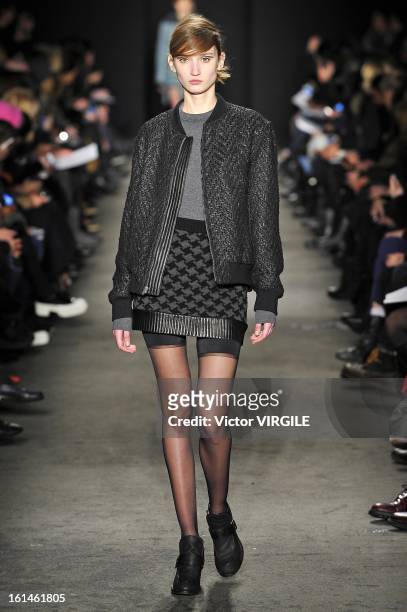 Model walks the runway at the Rag & Bone Women's Ready to Wear Fall/Winter 2013-2014 fashion show during Mercedes-Benz Fashion Week at Skylight...