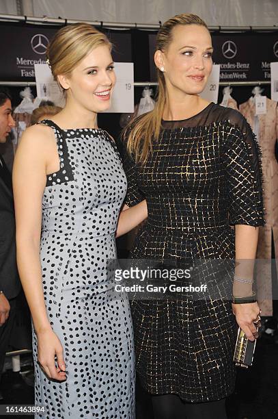 Actresses Maggie Grace and Molly Sims attend the Carolina Herrera fashion show during Fall 2013 Mercedes-Benz Fashion Week at The Theatre at Lincoln...