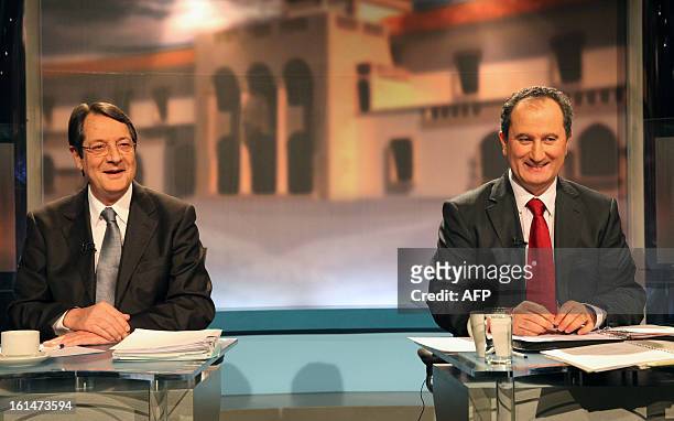 Nikos Anastasiadis, Stavros Malas and George Lillikas , the three major candidates in the Cypriot presidential election, attend the last televised...