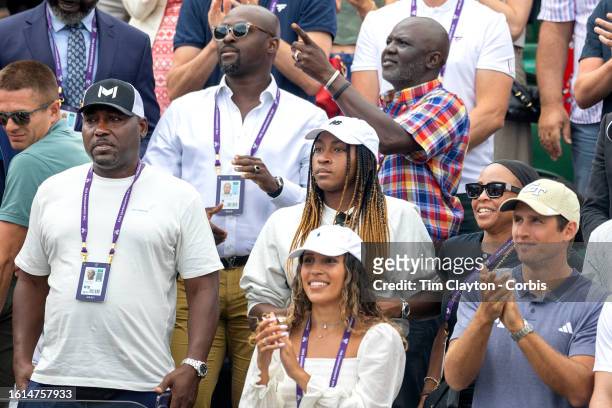 Coco Gauff of the United States with parents Candi Gauff and Corey Gauff watching Christopher Eubanks of the United States against Stefanos Tsitsipas...
