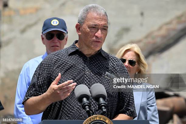 Maui Mayor Richard Bissen delivers remarks as US President Joe Biden listens during a visit to an area devastated by wildfires in Lahaina, Hawaii on...