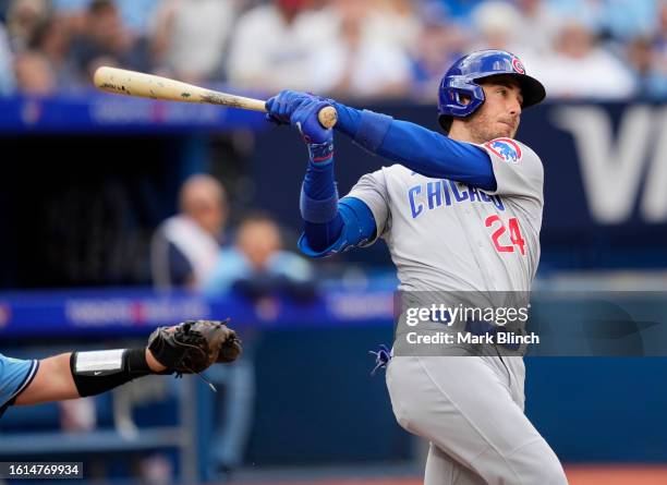 Cody Bellinger of Chicago Cubs swings against the Toronto Blue Jays during the fourth inning in their MLB game at the Rogers Centre on August 12,...