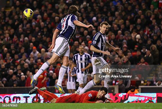 Luis Suarez of Liverpool goes down in the penalty box during the Barclays Premier League match between Liverpool and West Bromwich Albion at Anfield...