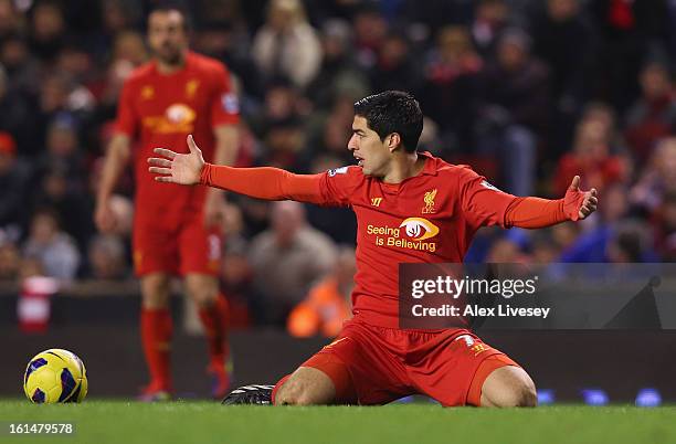 Luis Suarez of Liverpool reacts during the Barclays Premier League match between Liverpool and West Bromwich Albion at Anfield on February 11, 2013...