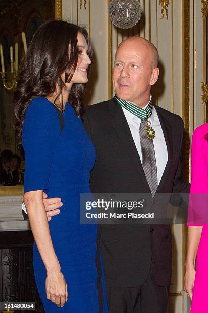 Bruce Willis poses with his wife Emma Heming-Willis after being awarded 'Commandeur dans l'Ordre des Arts et Lettres' at Ministere de la Culture on...