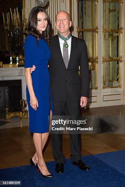Bruce Willis poses with his wife Emma Heming-Willis after being awarded 'Commandeur dans l'Ordre des Arts et Lettres' at Ministere de la Culture on...