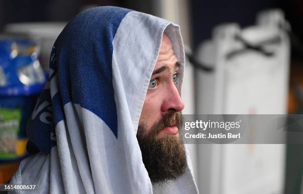 Drew Rom of the St. Louis Cardinals looks on from the dugout in the first inning during his MLB debut in the game against the Pittsburgh Pirates at...