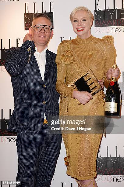 Gwendoline Christie poses wth Giles Deacon after he presented the Best TV Show Award for Game Of Thrones in the press room at The Elle Style Awards...