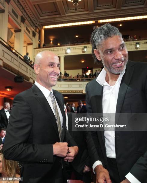 Manu Ginóbili & Tim Duncan look on during the 2023 Basketball Hall of Fame Enshrinement Ceremony on August 12, 2023 at Springfield Marriott in...