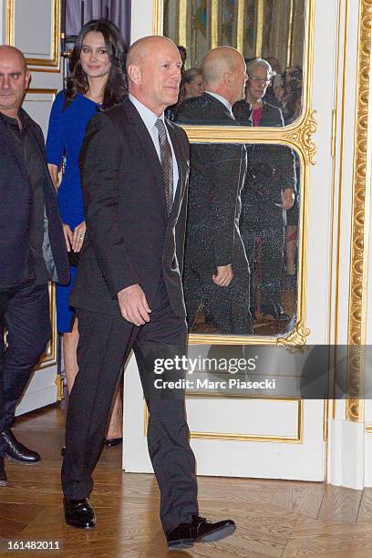 Bruce Willis arrives to receives the 'Commandeur dans l'Ordre des Arts et Lettres' medal from french minister of Culture Aurelie Filipetti at...
