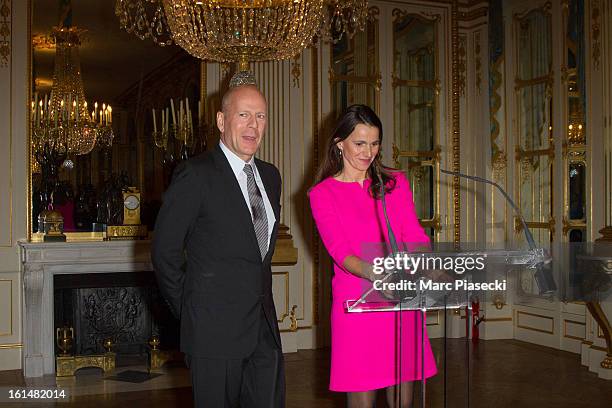 Bruce Willis receives the 'Commandeur dans l'Ordre des Arts et Lettres' medal from french minister of Culture Aurelie Filipetti at Ministere de la...