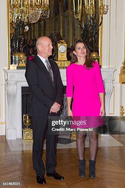 Bruce Willis receives the 'Commandeur dans l'Ordre des Arts et Lettres' medal from french minister of Culture Aurelie Filipetti at Ministere de la...