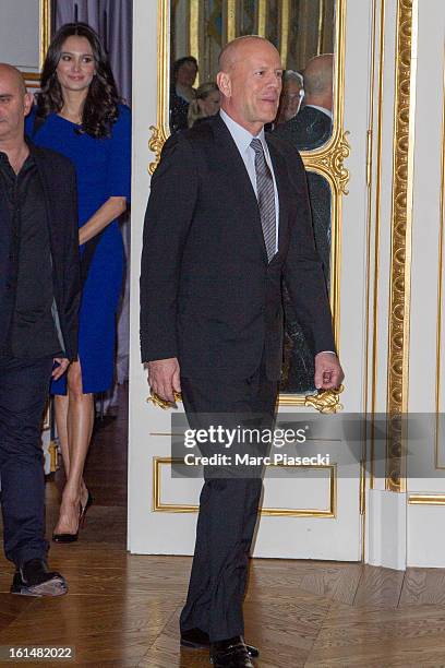 Bruce Willis arrives to receives the 'Commandeur dans l'Ordre des Arts et Lettres' medal from french minister of Culture Aurelie Filipetti at...