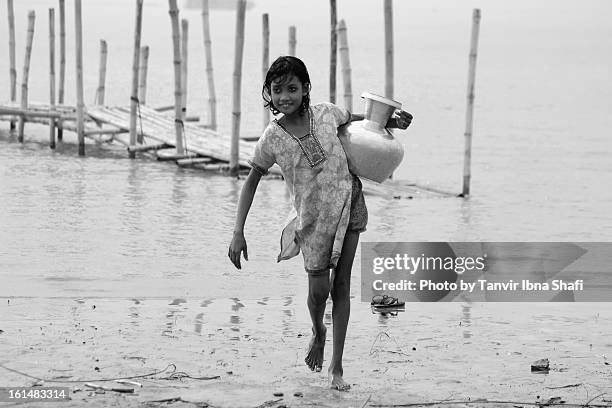 river girl - girls in wet dresses stock-fotos und bilder