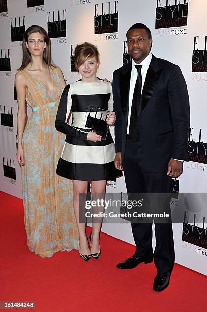 Kendra Spears, Next Future Icon winner Chloe Moretz and Chris Tucker pose in the press room during the Elle Style Awards at The Savoy Hotel on...