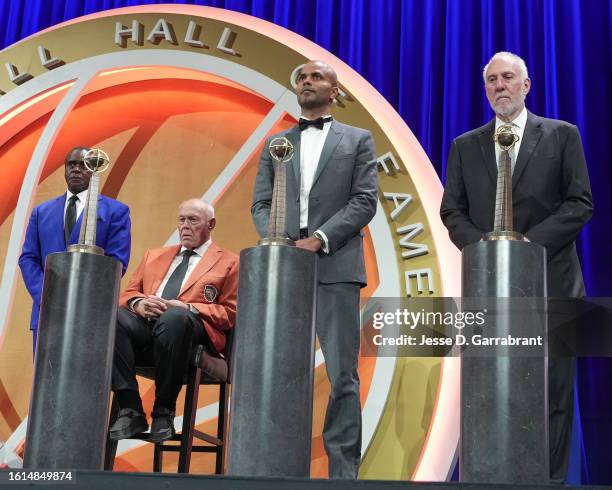 Ahmad Rashad, gene Keady, Tony Parker, Gregg Popovich look on during the 2023 Basketball Hall of Fame Enshrinement Ceremony on August 12, 2023 at...