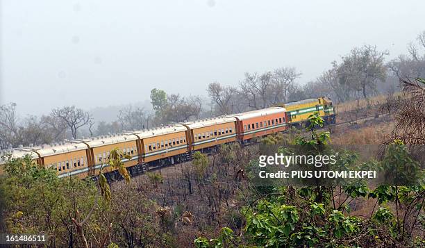 Sixteen-coach train is driven from Lagos to Kano February 8, 2013. The rejuvenated Nigerian Railway Corporation has resumed passenger and haulage...