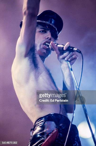 Freddie Mercury performs with Queen at the Oakland Coliseum on December 16, 1978 in Oakland, California.