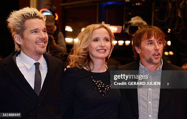 Actor and screenwriter Ethan Hawke, French-born US actress Julie Delpy and US film director Richard Linklater pose for photographers as they arrive...