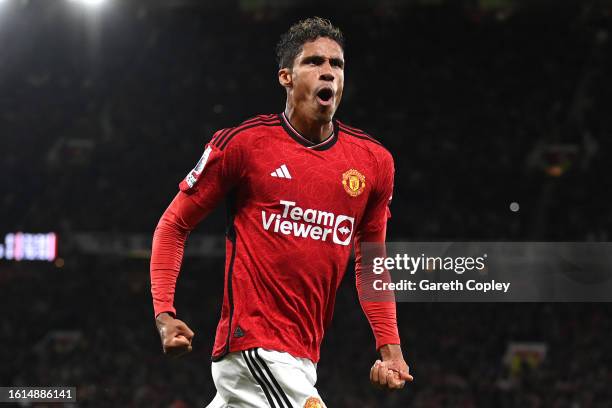 Raphael Varane of Manchester United celebrates after scoring the team's first goal during the Premier League match between Manchester United and...