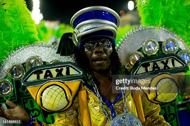 Dancers and musicians of São Clemente Samba School during the opening parade whose theme Horario Nobre tells in chapters the story of several...