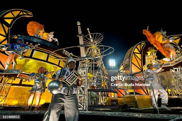 Dancers and musicians of São Clemente Samba School during the opening parade whose theme Horario Nobre tells in chapters the story of several...