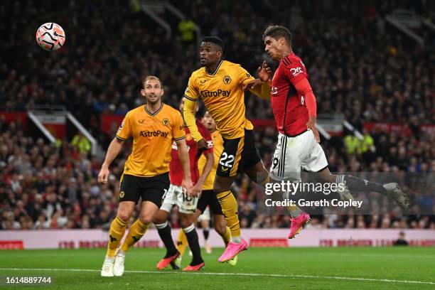 Raphael Varane of Manchester United scores the team's first goal during the Premier League match between Manchester United and Wolverhampton...