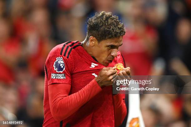 Raphael Varane of Manchester United celebrates after scoring the team's first goal during the Premier League match between Manchester United and...