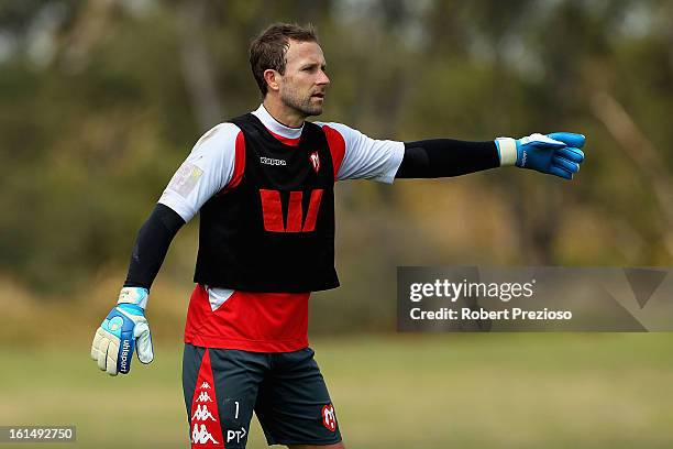 Clint Bolton gives instructions during a Melbourne Heart A-League training session at La Trobe University Sports Fields on February 12, 2013 in...