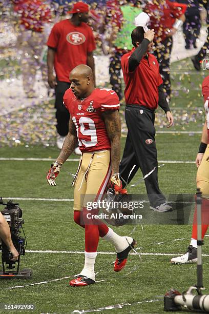 Wide Reciever Ted Ginn, Jr. #19 of the San Francisco 49ers exits the field after handling the ball on the game's final play against the Baltimore...