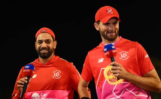 Haris Rauf and Shaheen Shah Afridi of Welsh Fire Men looks on as they are interviewed following The Hundred match between Welsh Fire Men and Trent...