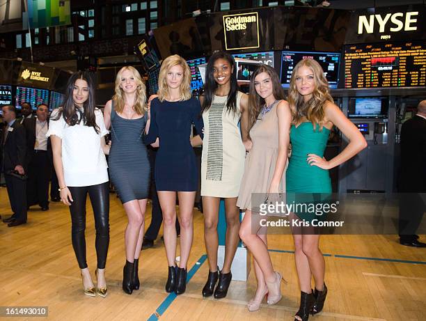 Jessica Gome, Anne V, Kate Bock, Adaora Cobb, Natasha Barnard and Jessica Perez pose for a photo during the closing bell at New York Stock Exchange...