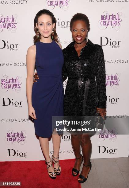 Actresses Emmy Rossum and Viola Davis attend The Cinema Society And Dior Beauty Presents A Screening Of "Beautiful Creatures" at Tribeca Cinemas on...