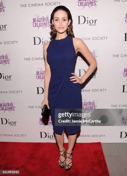Actress Emmy Rossum attends The Cinema Society And Dior Beauty Presents A Screening Of "Beautiful Creatures" at Tribeca Cinemas on February 11, 2013...