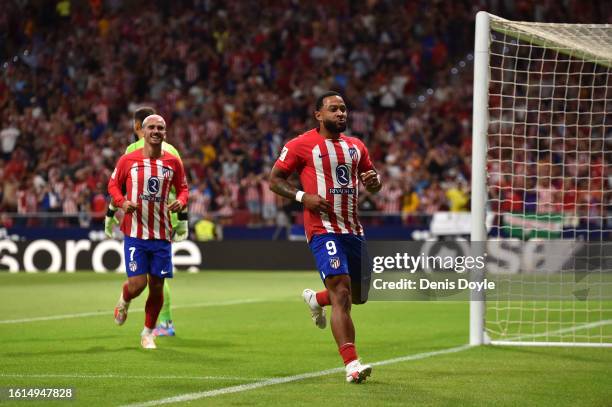 Memphis Depay of Atletico Madrid celebrates after scoring the team's second goal during the LaLiga EA Sports match between Atletico Madrid and...