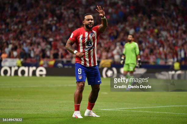 Memphis Depay of Atletico Madrid celebrates after scoring the team's second goal during the LaLiga EA Sports match between Atletico Madrid and...
