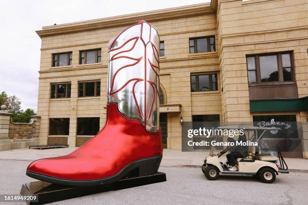 You never know what you're going to come across while taking the Universal Studios Tram tour on May 25, 2023. The huge cowboy boot was used as a prop...