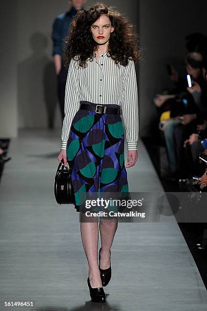 Model walks the runway at the Marc by Marc Jacobs Autumn Winter 2013 fashion show during New York Fashion Week on February 11, 2013 in New York,...