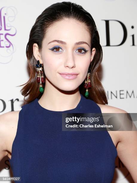 Actress Emmy Rossum arrives at The Cinema Society And Dior Beauty host a screening of "Beautiful Creatures" at Tribeca Cinemas on February 11, 2013...