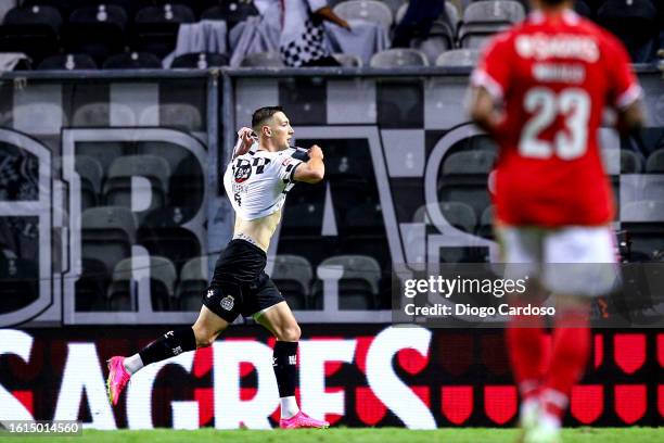 Robert Bozenik of Boavista FC celebrates after scoring his team's third goal during the Liga Portugal Bwin match between Boavista and SL Benfica at...