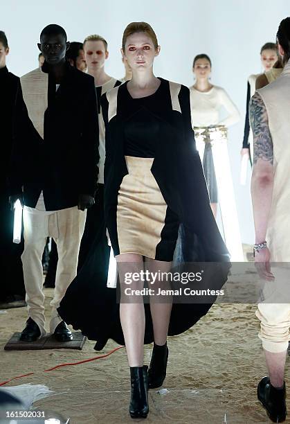 Model walks the runway at the Odd fall 2013 presentation during Mercedes-Benz Fashion Week at Industria Superstudio on February 11, 2013 in New York...