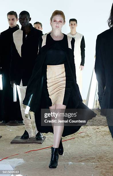 Model walks the runway at the Odd fall 2013 presentation during Mercedes-Benz Fashion Week at Industria Superstudio on February 11, 2013 in New York...