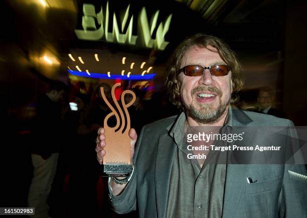 Actor Armin Rohde celebrates his award at the aftershow party of the 'Deutscher Schauspielerpreis' during the 63rd Berlinale International Film...