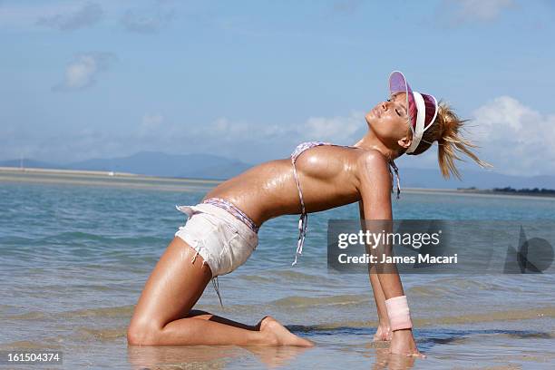 Swimsuit Issue 2013: Model Genevieve Morton poses for the 2013 Sports Illustrated Swimsuit issue on May 11, 2012 in Hayman Island, Australia....