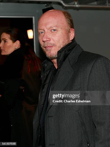 Director Paul Haggis arrives at The Cinema Society And Dior Beauty host a screening of "Beautiful Creatures" at Tribeca Cinemas on February 11, 2013...