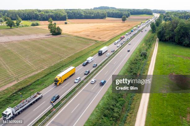 traffic jam on highway, aerial view - main road stock pictures, royalty-free photos & images